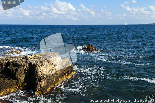 Image of Rock and blue sea 