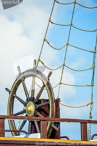 Image of wheel of an old sailing ship