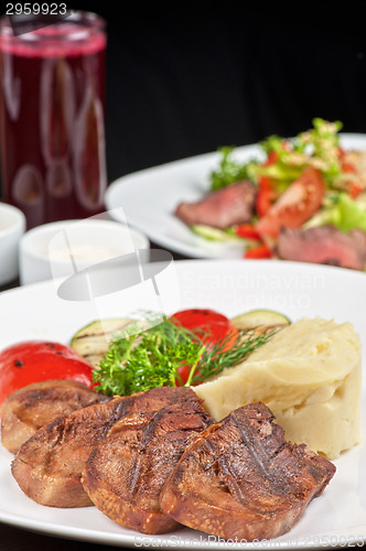 Image of tongue with grilled vegetable