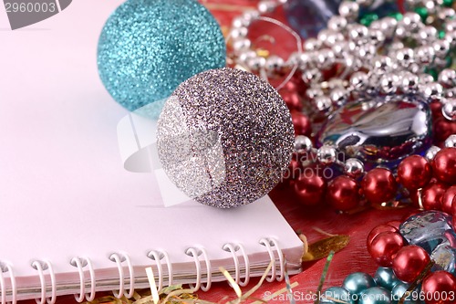 Image of christmas ornament with pearls, new year card