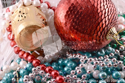 Image of Beautiful ornaments, champagne, pearl and balls as a New Year decoration