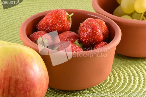 Image of fresh fruits. strawberry, apple, grape