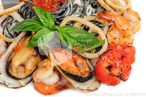 Image of Black Pasta with sea food and basil