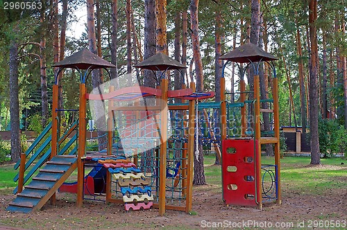 Image of Bright children's playground in the woods