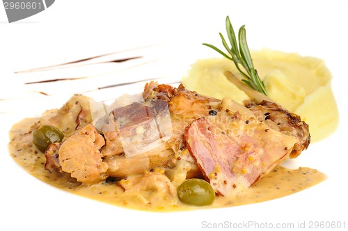 Image of Rabbit legs with potato puree and rosemary