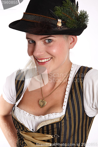 Image of Young blonde woman in traditional bavarian costume