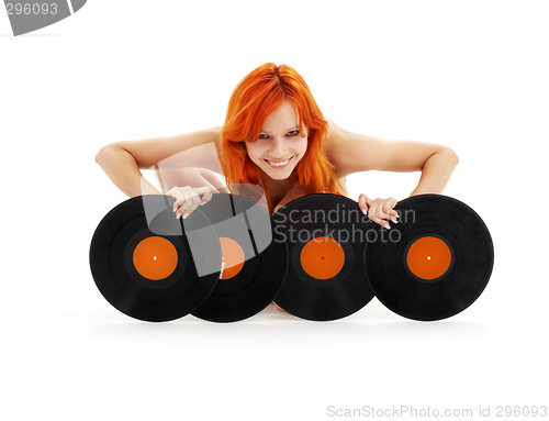 Image of lovely redhead with vinyl records