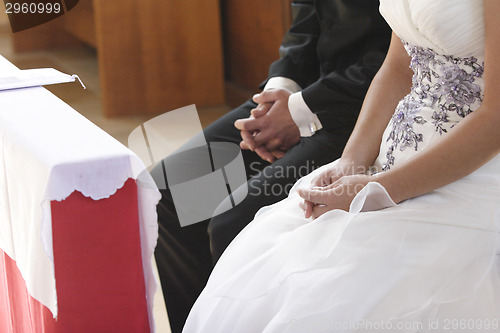 Image of Hands of a bride and groom