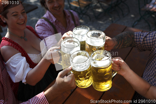 Image of People drinking beer in a traditional Bavarian beer garden