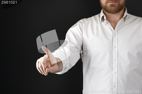 Image of Man pointing at something