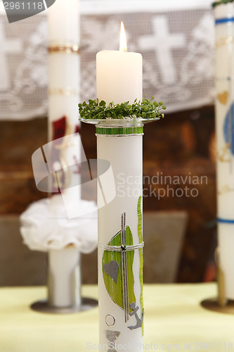 Image of Burning candle at the communion