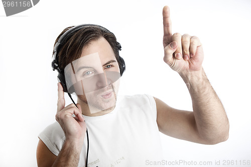 Image of Attractive man with headphones in front of a white background da