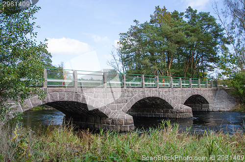 Image of Old bridge over a small river