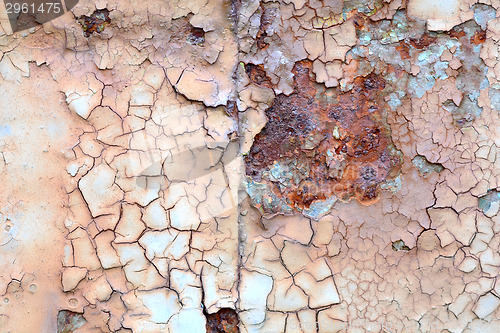Image of chipped metal plating on scratched wall, grunge background