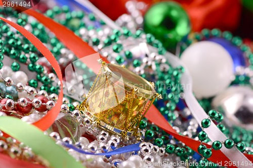 Image of Christmas decorations, new year invitation card, drums, pearls and xmas balls