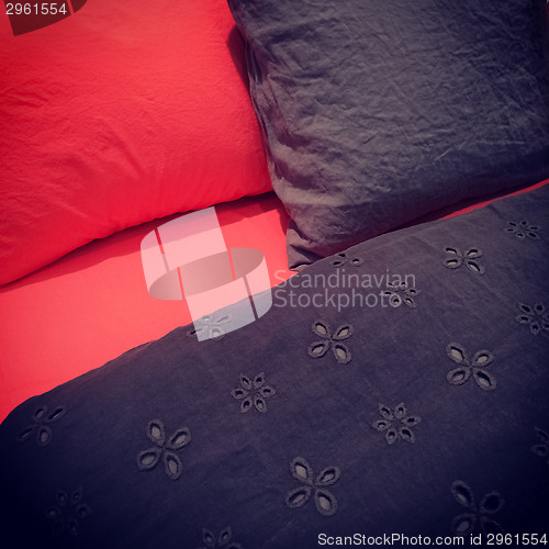 Image of Red and black bed linen