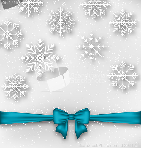 Image of Christmas wrapping with bow ribbon and snowflakes