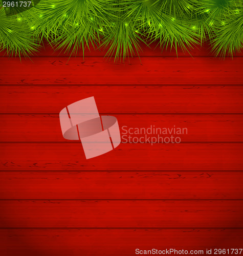 Image of Christmas wooden background with fir twigs