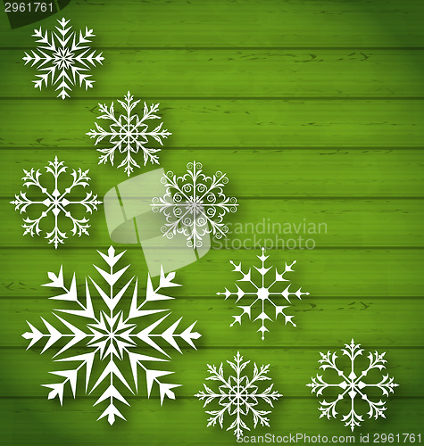 Image of Set geometric snowflakes on wooden background