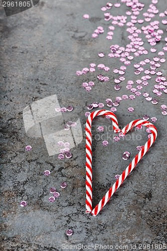 Image of Christmas decorations - sequins and candy canes