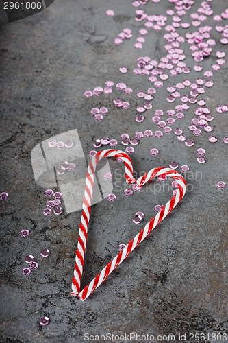 Image of Christmas decorations - sequins and candy canes