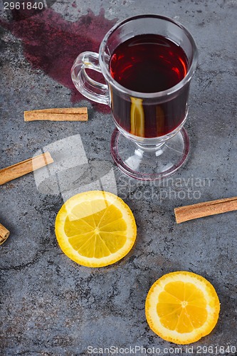 Image of Spilled red mulled wine and orange