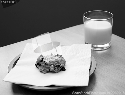 Image of Fresh cookie served with a glass of milk