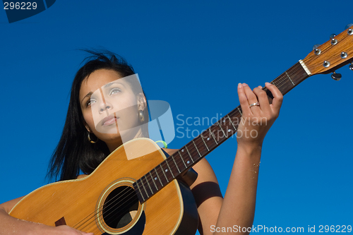 Image of Ethnic guitarist