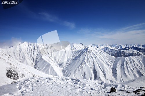 Image of Snowy mountains at nice sun day