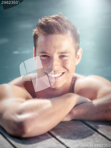 Image of handsome man pool
