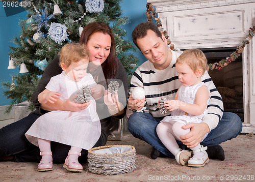 Image of Happy Family and Christmas Tree