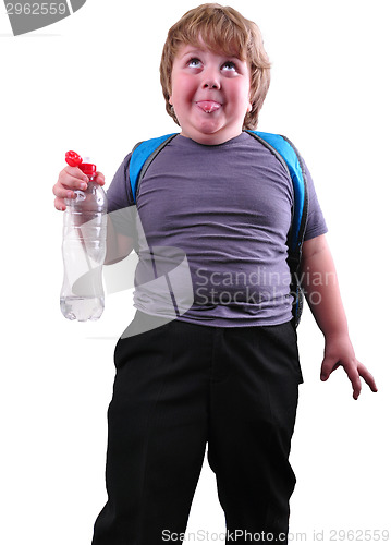 Image of closeup portrait of kid drinking water