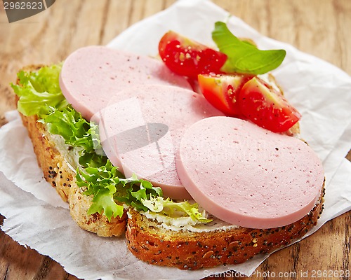 Image of sandwich with sliced sausage