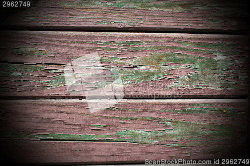 Image of old weathered painted plank