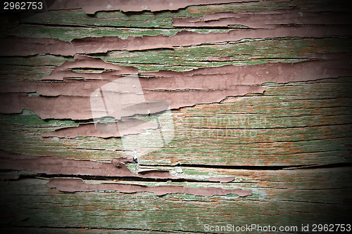 Image of grungy scratched painting on wood