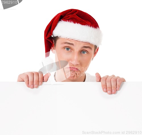 Image of Young man in Santa hat