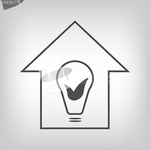 Image of Eco house with bulb and leaves