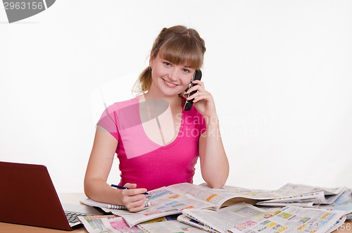 Image of Girl calls for a newspaper ad