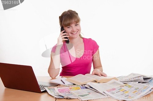 Image of Happy girl calling employer