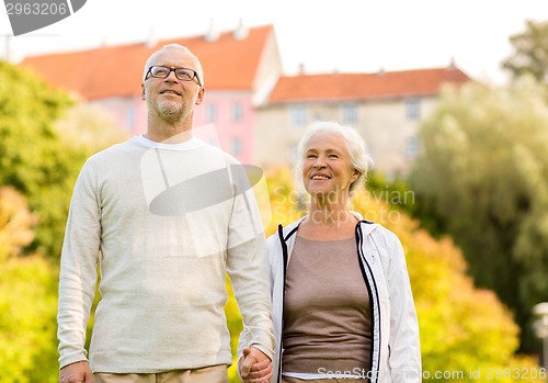 Image of senior couple in city park