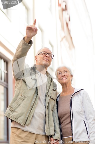 Image of senior couple on city street