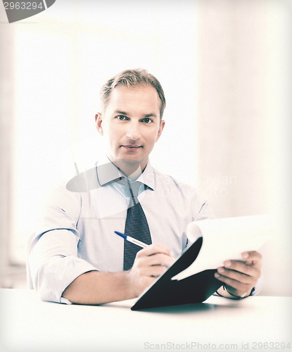 Image of businessman taking employment inteview