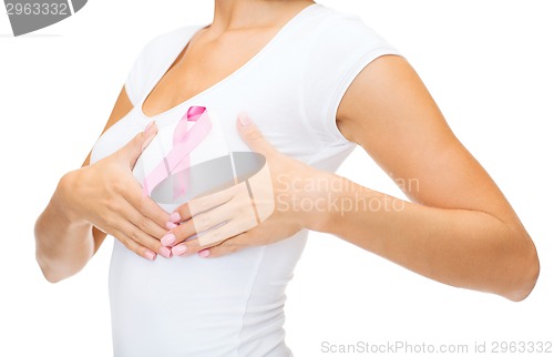 Image of woman with pink cancer awareness ribbon