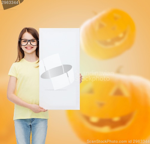 Image of smiling little girl with white board