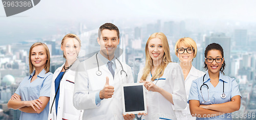 Image of team or group of doctors with tablet pc computer