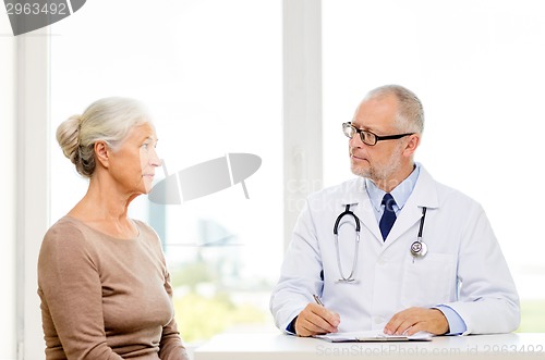 Image of senior woman and doctor meeting