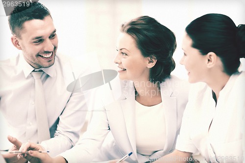 Image of business team having discussion in office