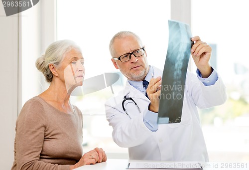 Image of senior woman and doctor meeting