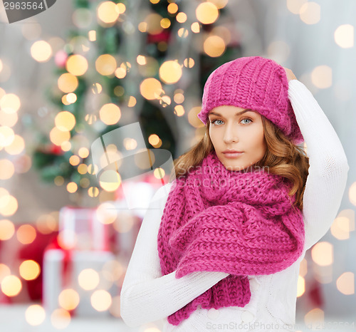 Image of smiling young woman in winter clothes
