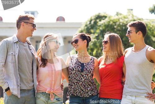 Image of group of smiling friends outdoors